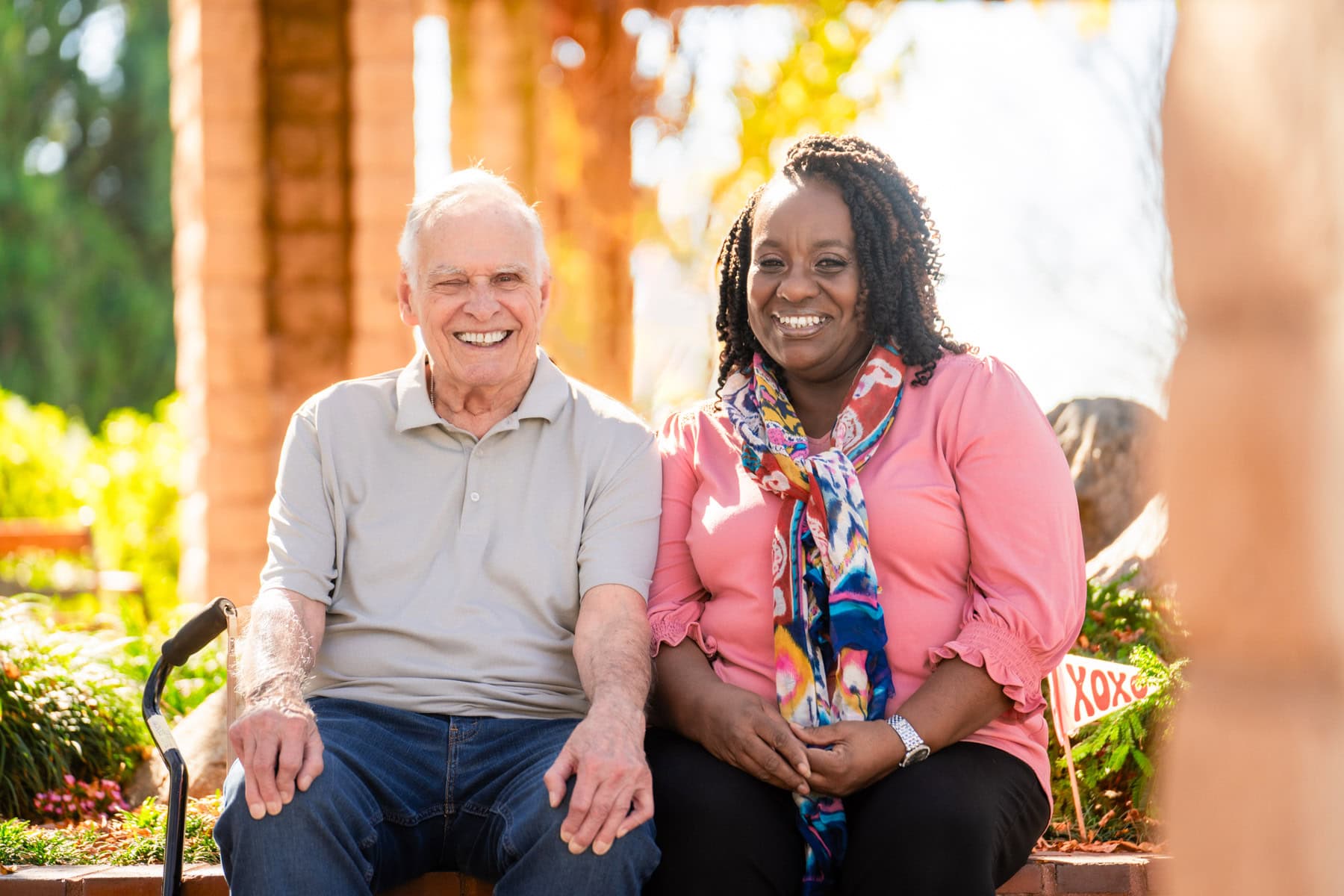 elderly man smiling with woman