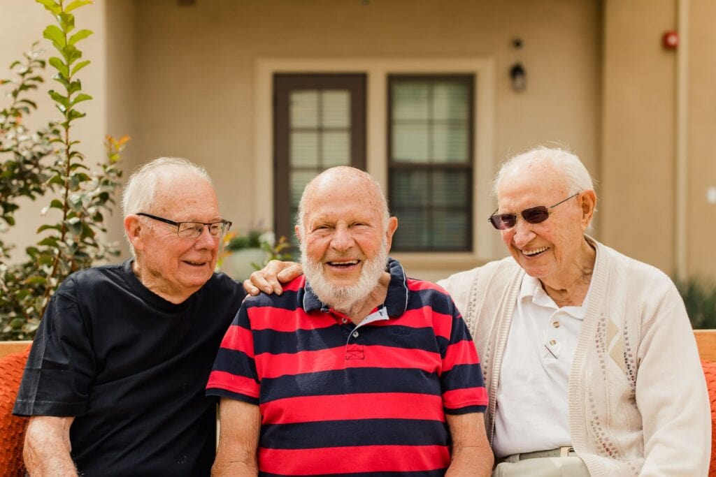 residents outside smiling