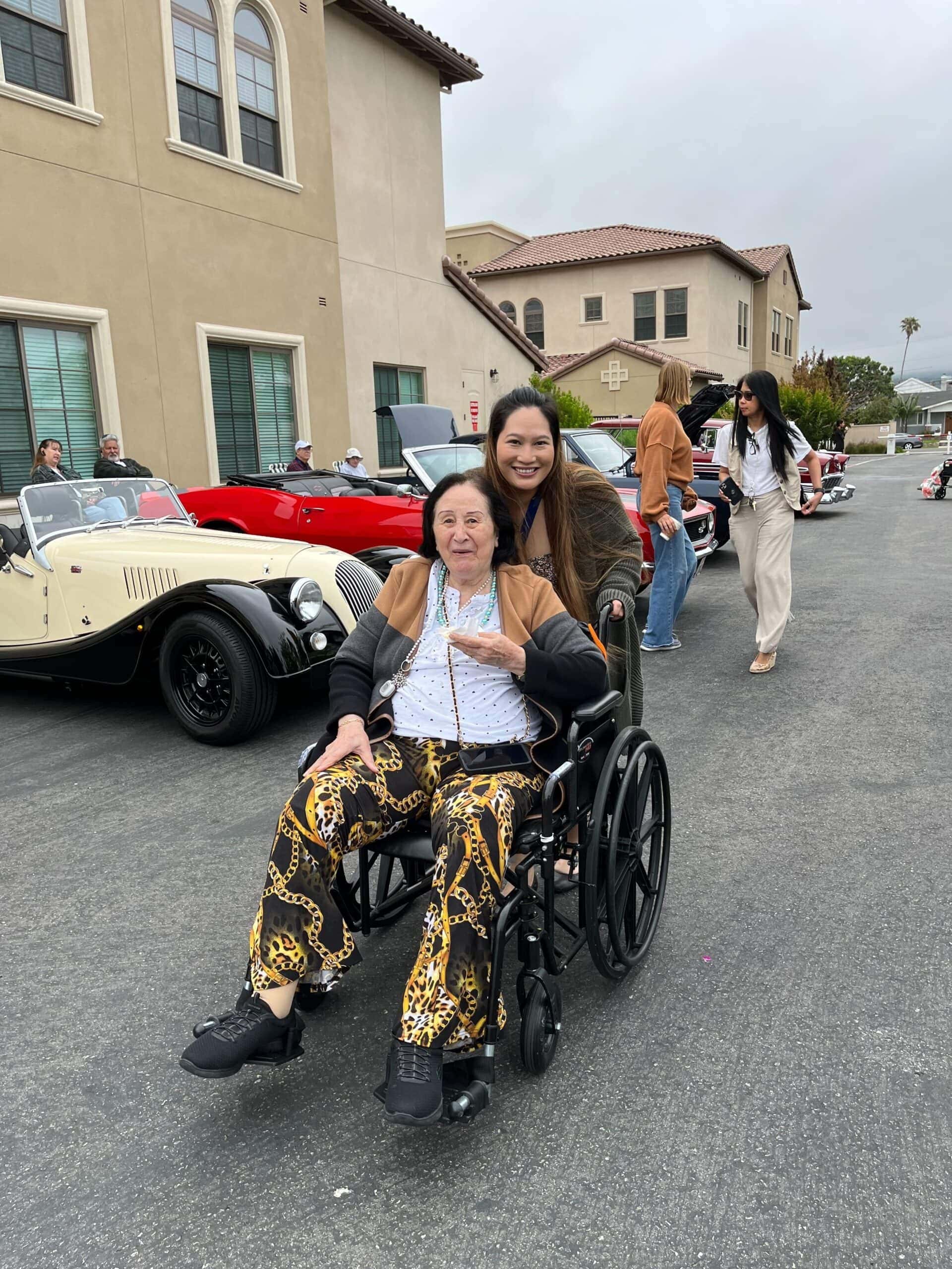 team member and resident during community car show