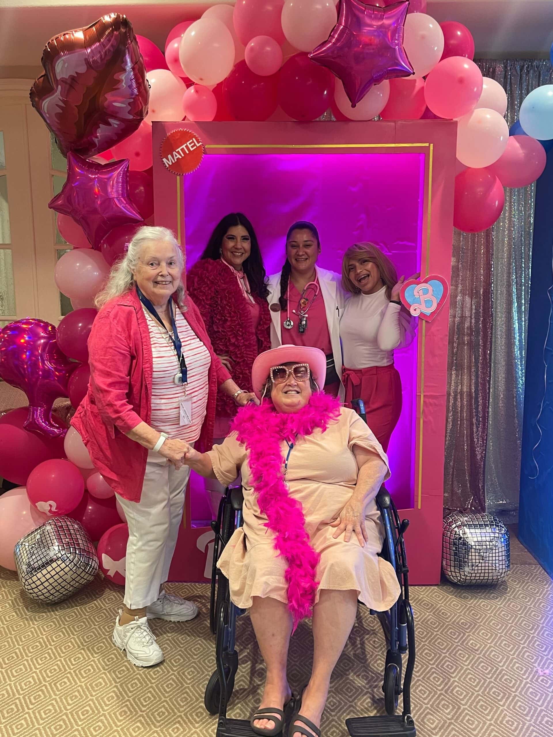 care team members and residents during Barbie celebration