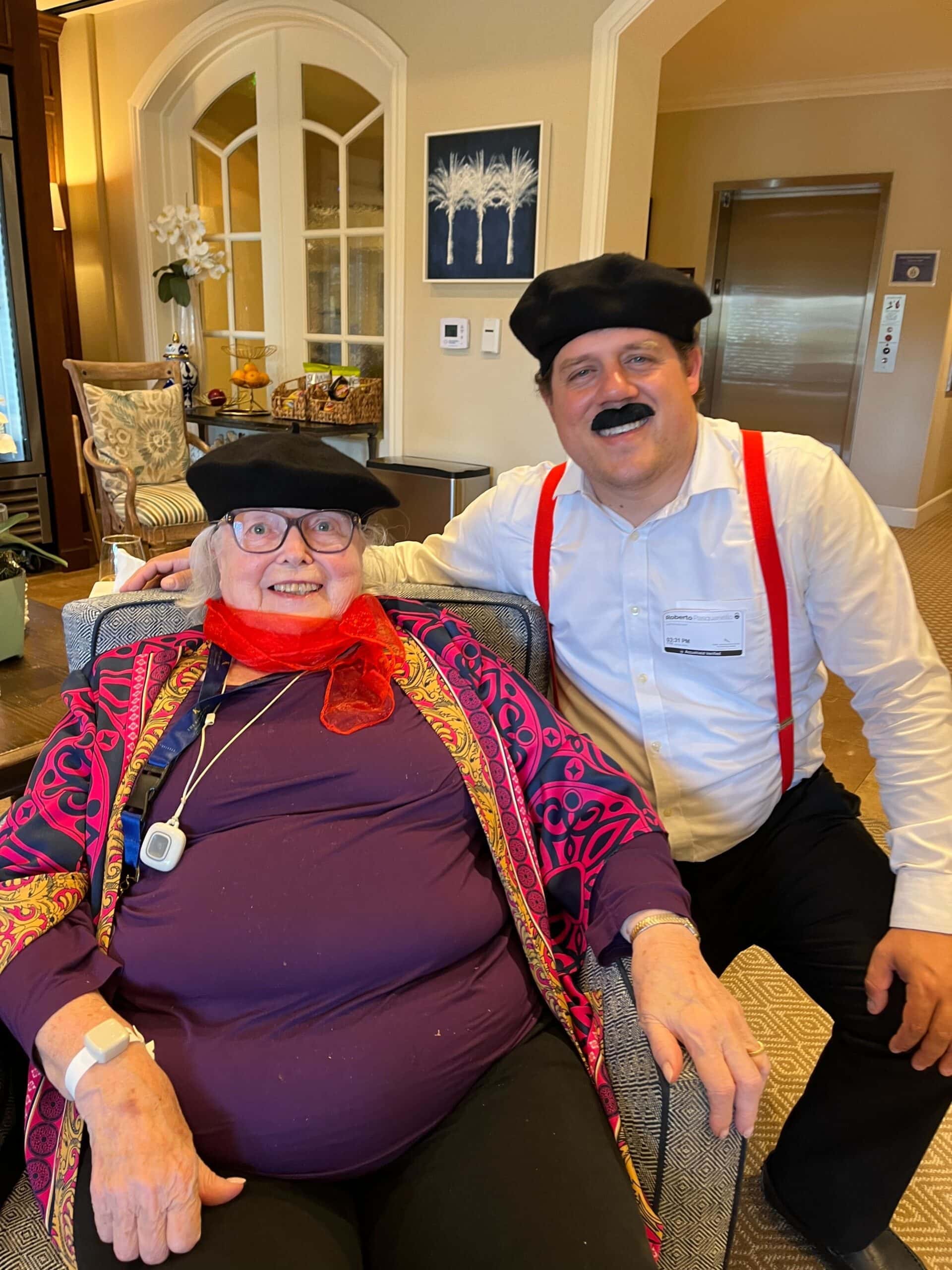 resident and care team member dressed up for event