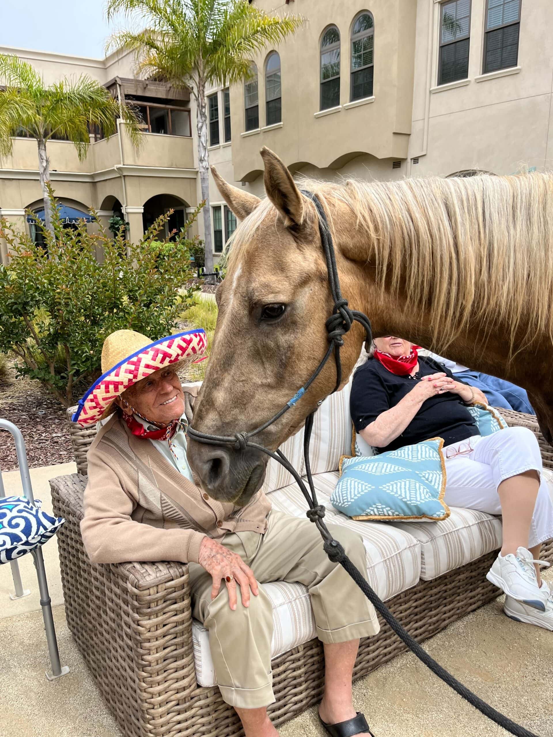 resident visiting with a horse