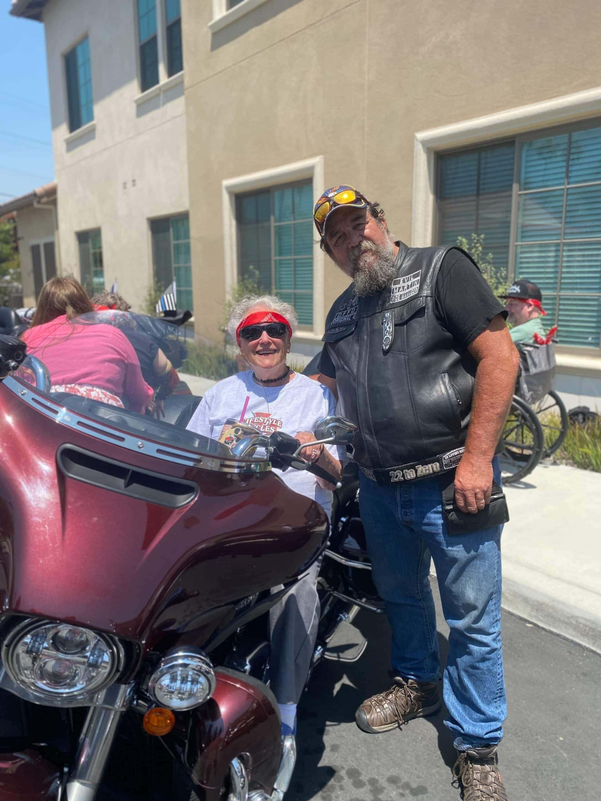 resident with biker and motorcycle