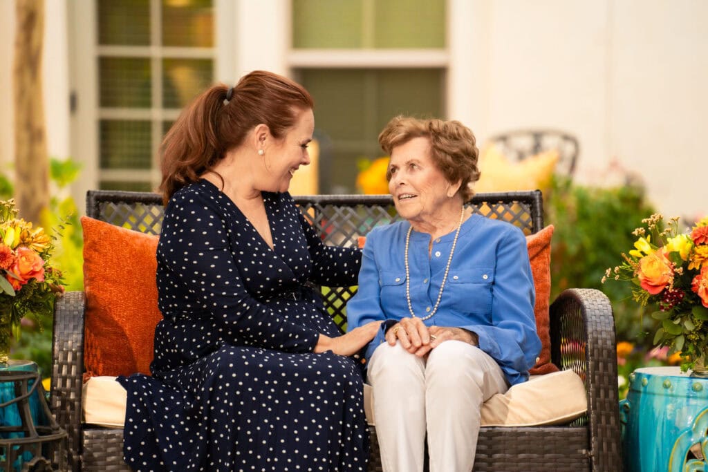 two women sitting together