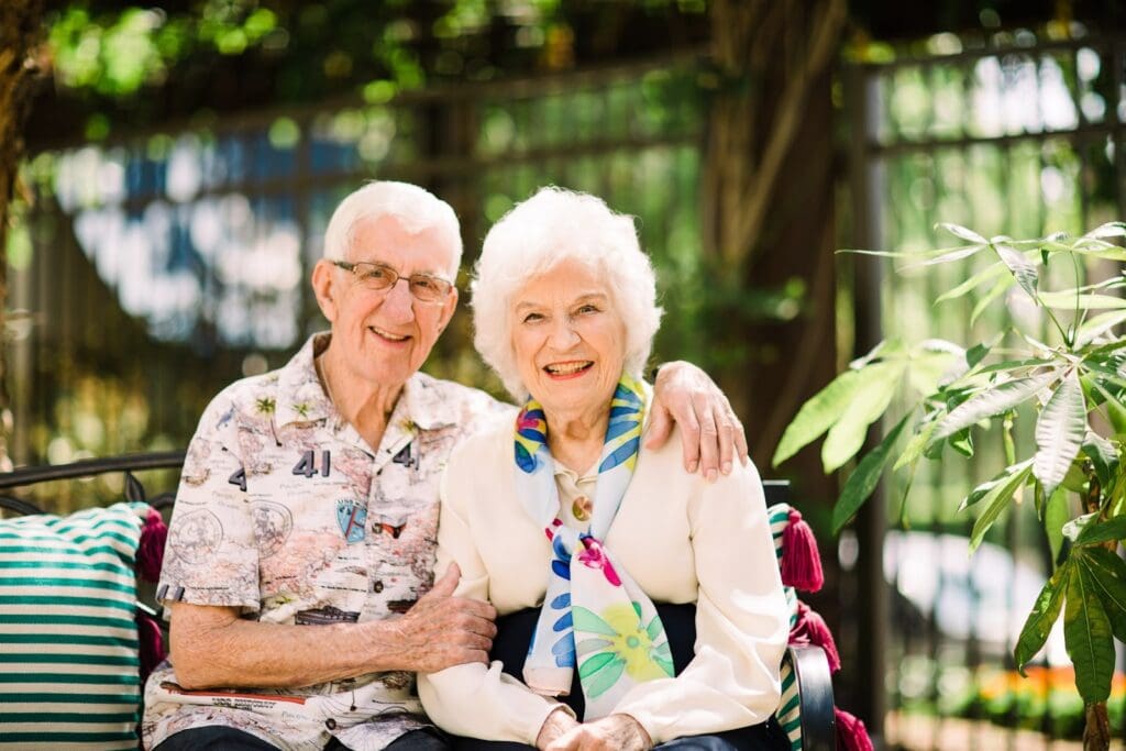 a man and woman enjoying their couples senior living community