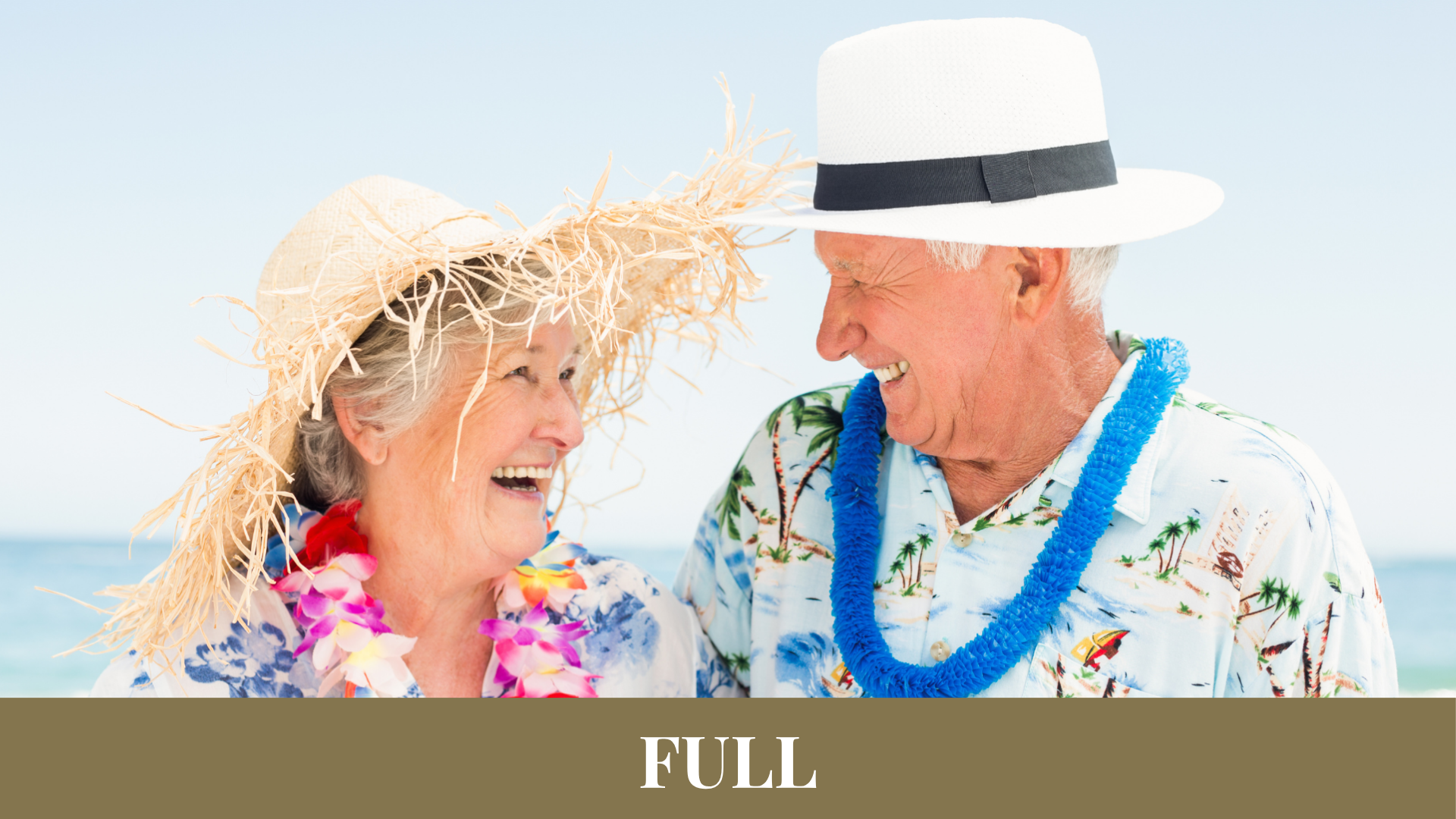 Two seniors at a Hawaiian party